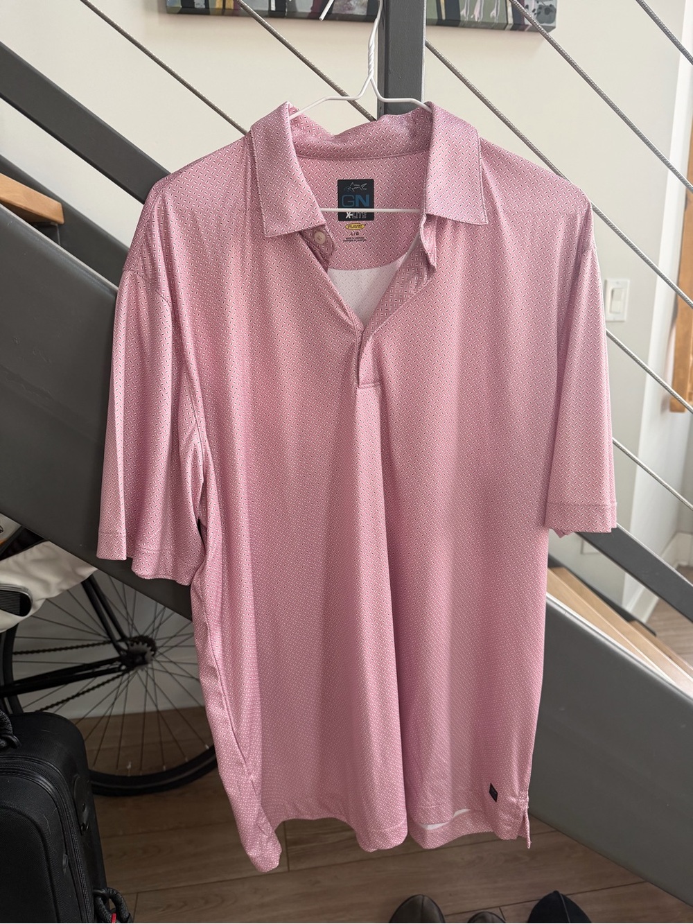 Pink Greg Norman X-Lite golf shirt